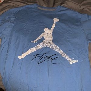light blue “flight” jumpman shirt